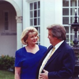 Pat and Milton in Front of Home