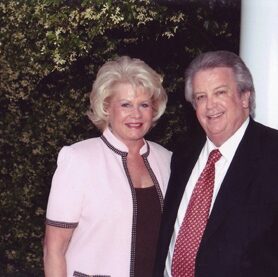 a couple of people posing for the camera