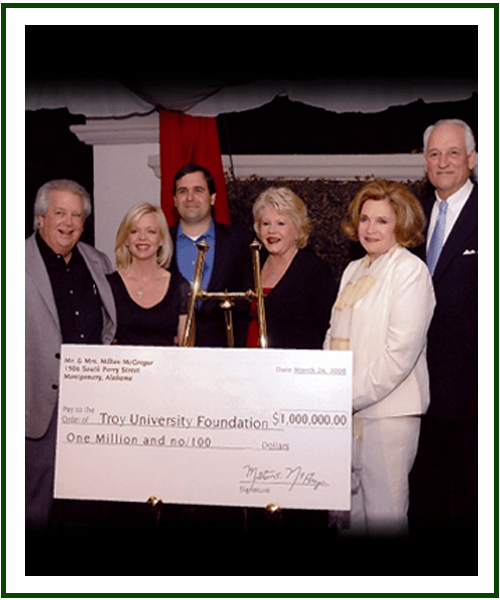 a group of people posing for the camera